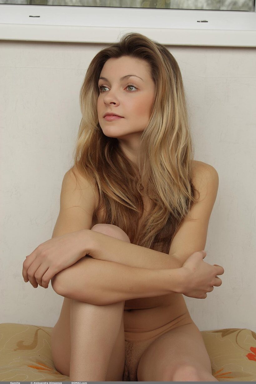 Image 16/20: Kamilla poses nude and teases with her perked nipples