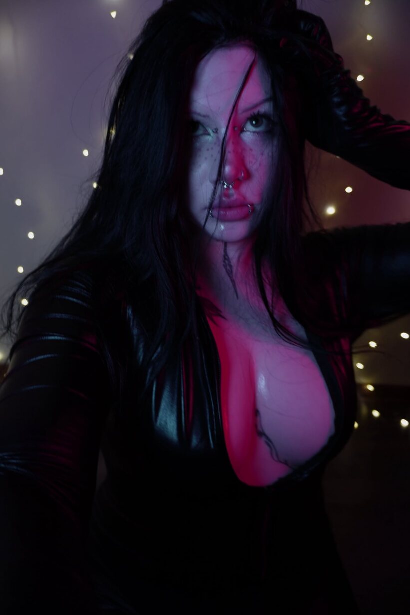 Photo 1 — Showing off her ass and feet, Kira Goth Girl poses for OnlyFans
