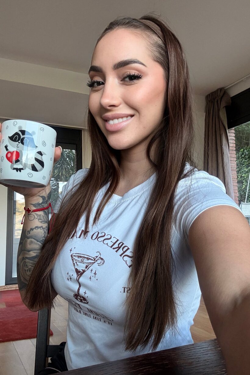 Image 2/11: Fully clothed solo model Haleema Ahmed shoots a set of self pics