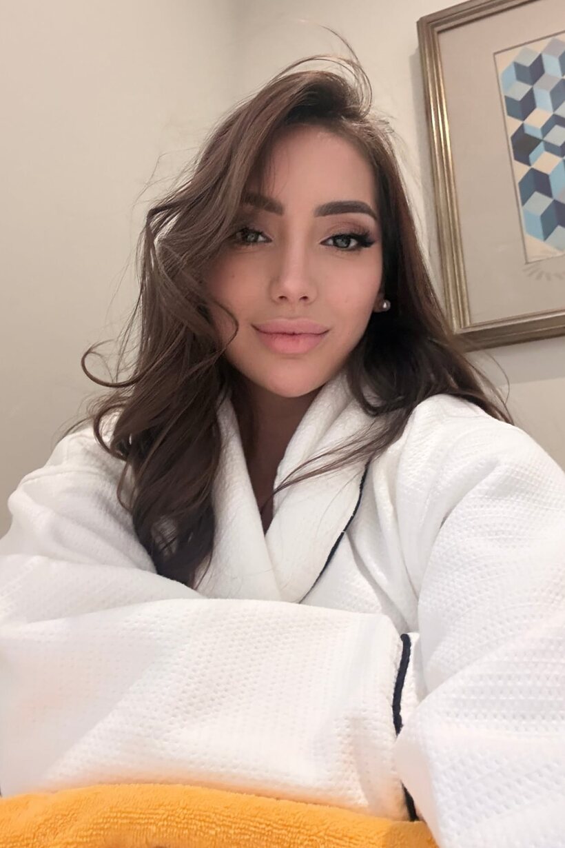 Photo 4 — Fully clothed solo model Haleema Ahmed shoots a set of self pics