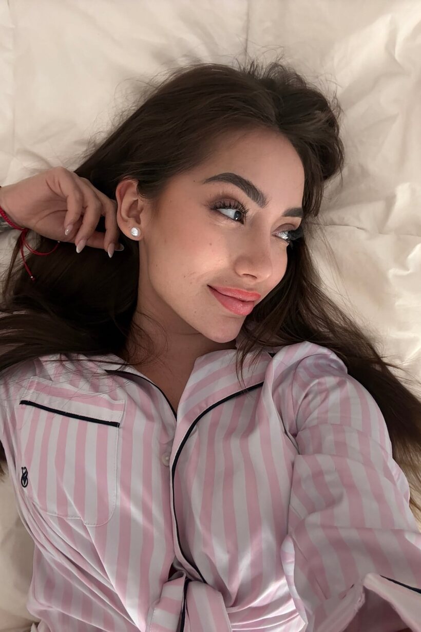 Photo 7 — Fully clothed solo model Haleema Ahmed shoots a set of self pics