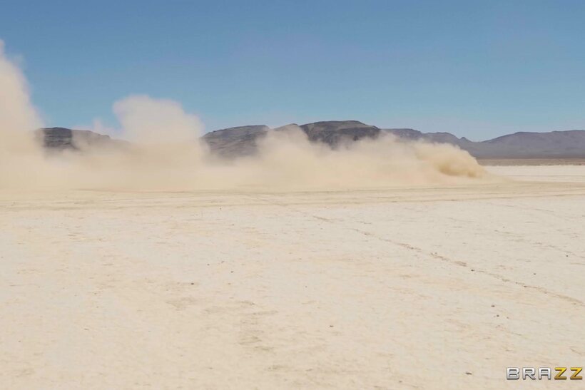 Image 1/21: Luna Star rides a dick in the desert, bouncing her big tits