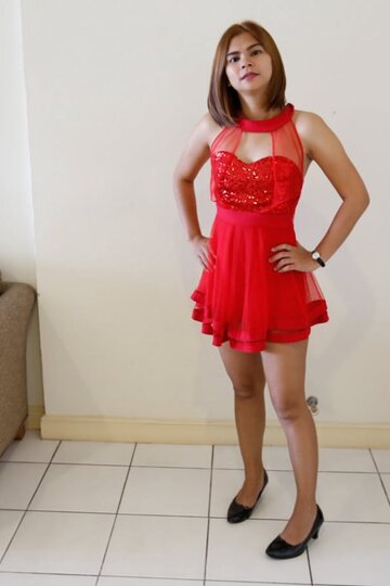 Asian amateur lifts her red dress and displays her ass and hairy twat