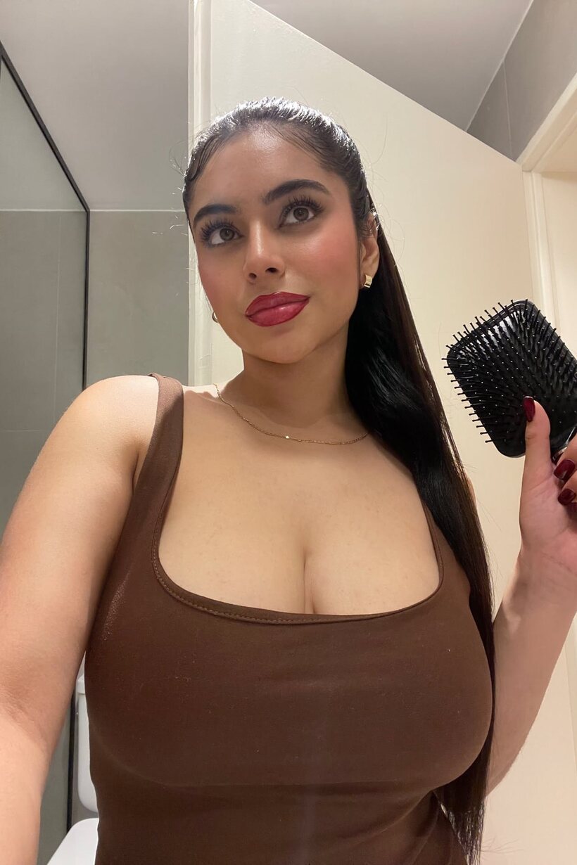 Image 12/20: Long-haired amateur takes selfies while flashing her big boobs