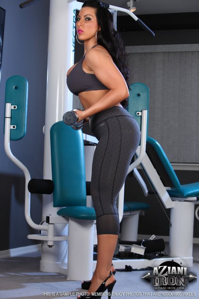 MILF Brianna Jordan in high heels shows her big tits and ass at the gym, photo 6 of 15