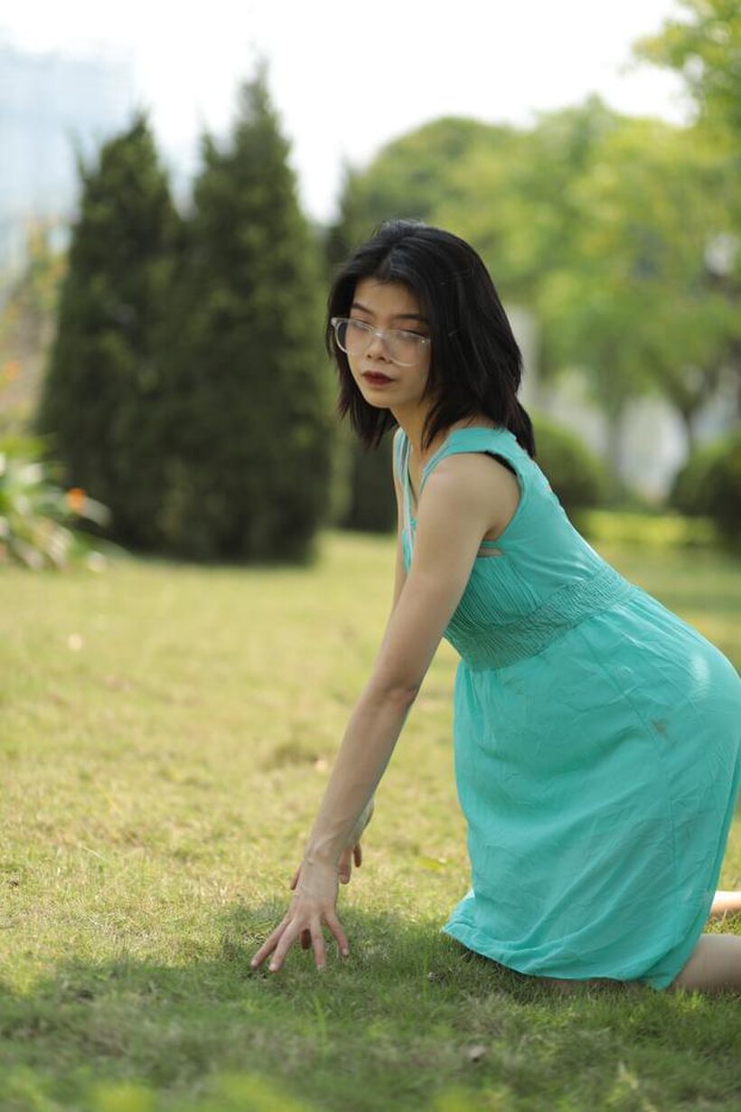 Image 7/21: Brunette girl strips out of her skirt and poses naked