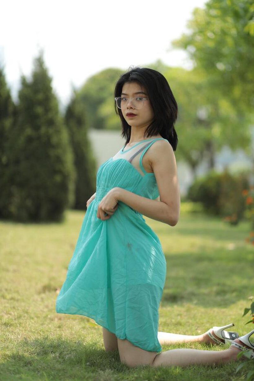Asian nude photo 9 — Brunette girl strips out of her skirt and poses naked