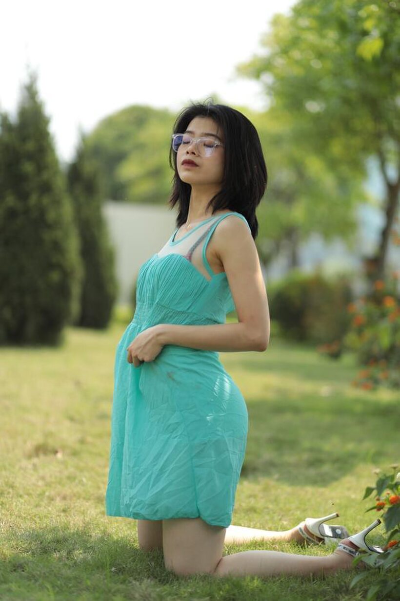 Brunette girl strips out of her skirt and poses naked (shot 14)