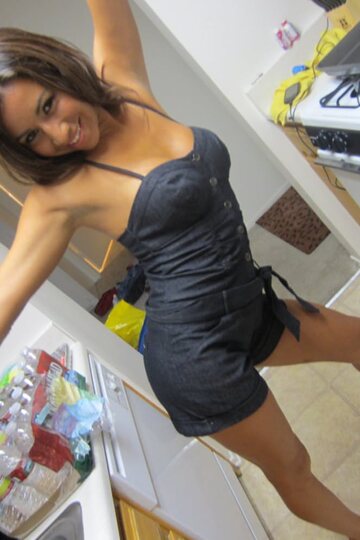 In bed, dark-haired beauties cuddle and kiss wearing shorts