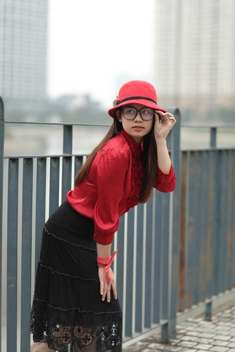 Image 1/21: Natalia poses in a classy outfit on the bridge, Asian solo