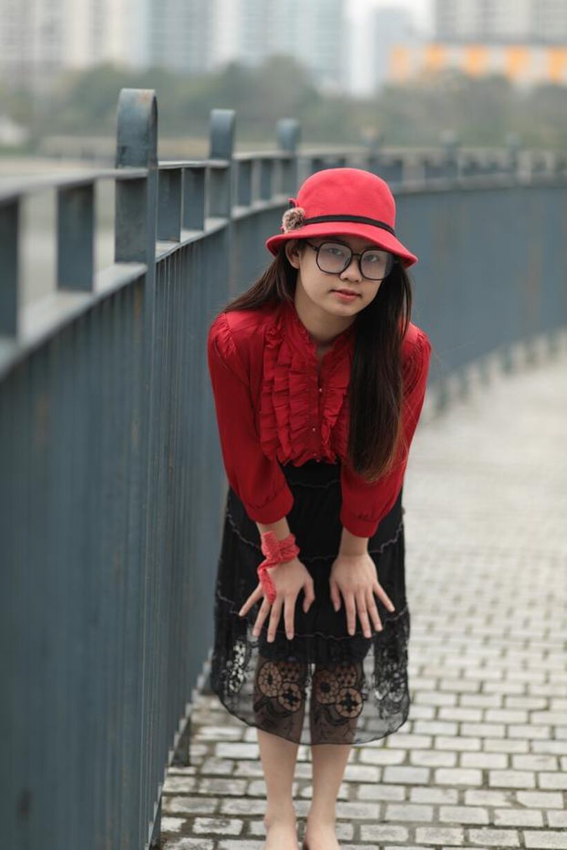 Photo 7 — Natalia poses in a classy outfit on the bridge, Asian solo
