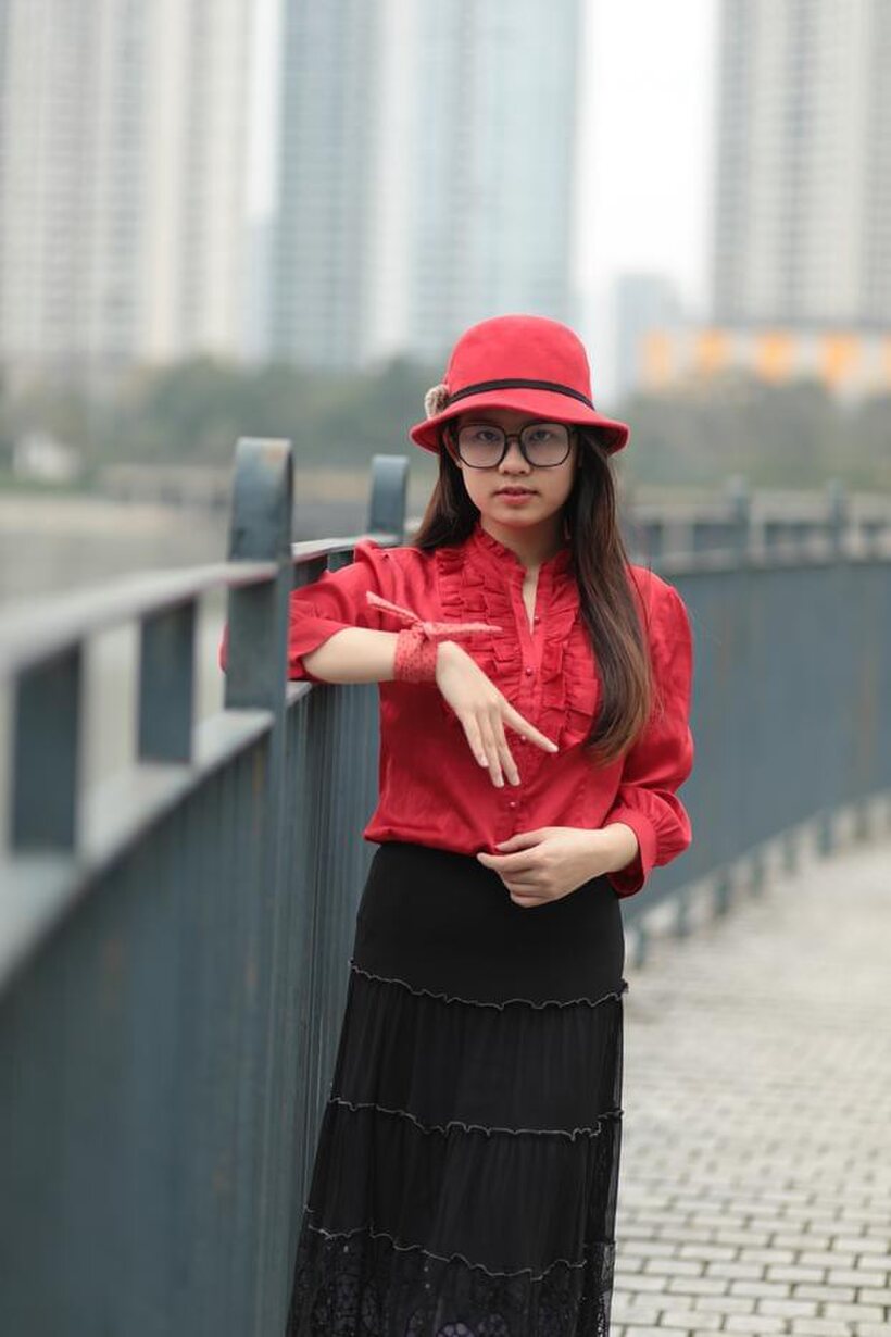 Image 9/21: Natalia poses in a classy outfit on the bridge, Asian solo