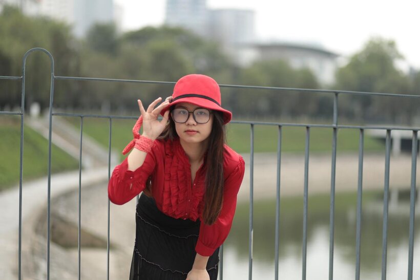 Photo 11 — Natalia poses in a classy outfit on the bridge, Asian solo