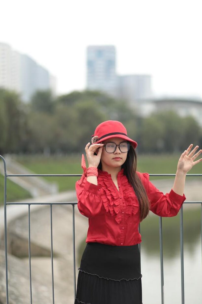 Photo 13 — Natalia poses in a classy outfit on the bridge, Asian solo