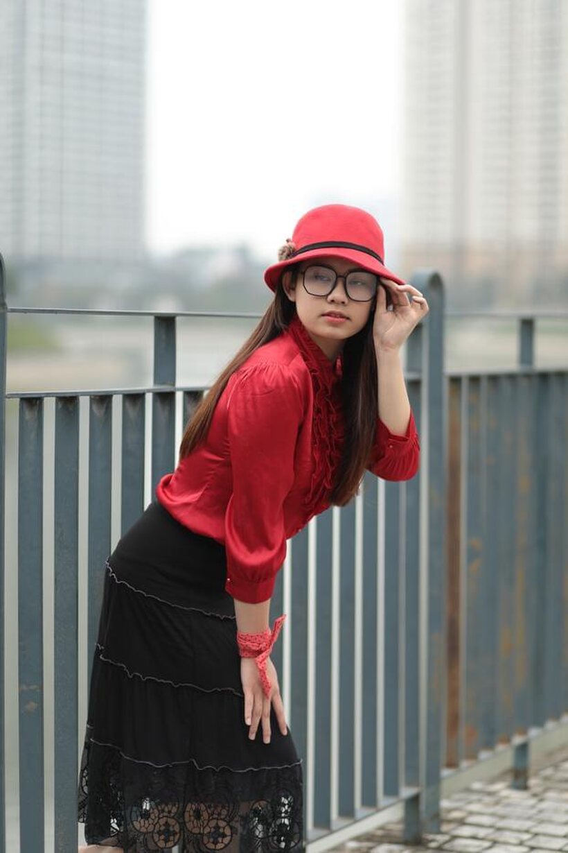 Image 21/21: Natalia poses in a classy outfit on the bridge, Asian solo