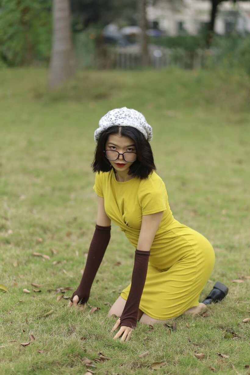 Asian nude photo 3 — Irena poses in a yellow dress and glasses, looking shy