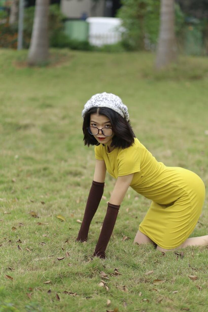 Asian nude photo 11 — Irena poses in a yellow dress and glasses, looking shy