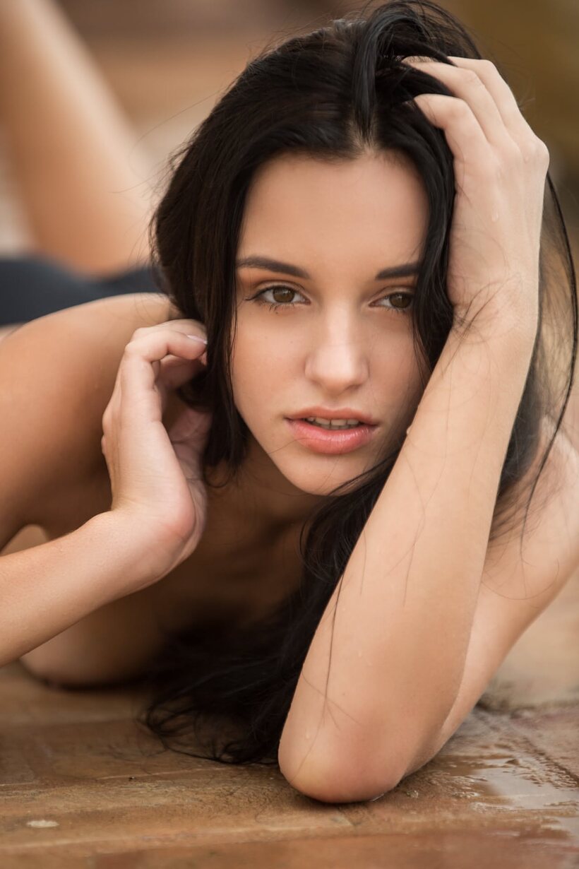 Sasha Sultana slips off her bikini top to tease poolside (shot 9)