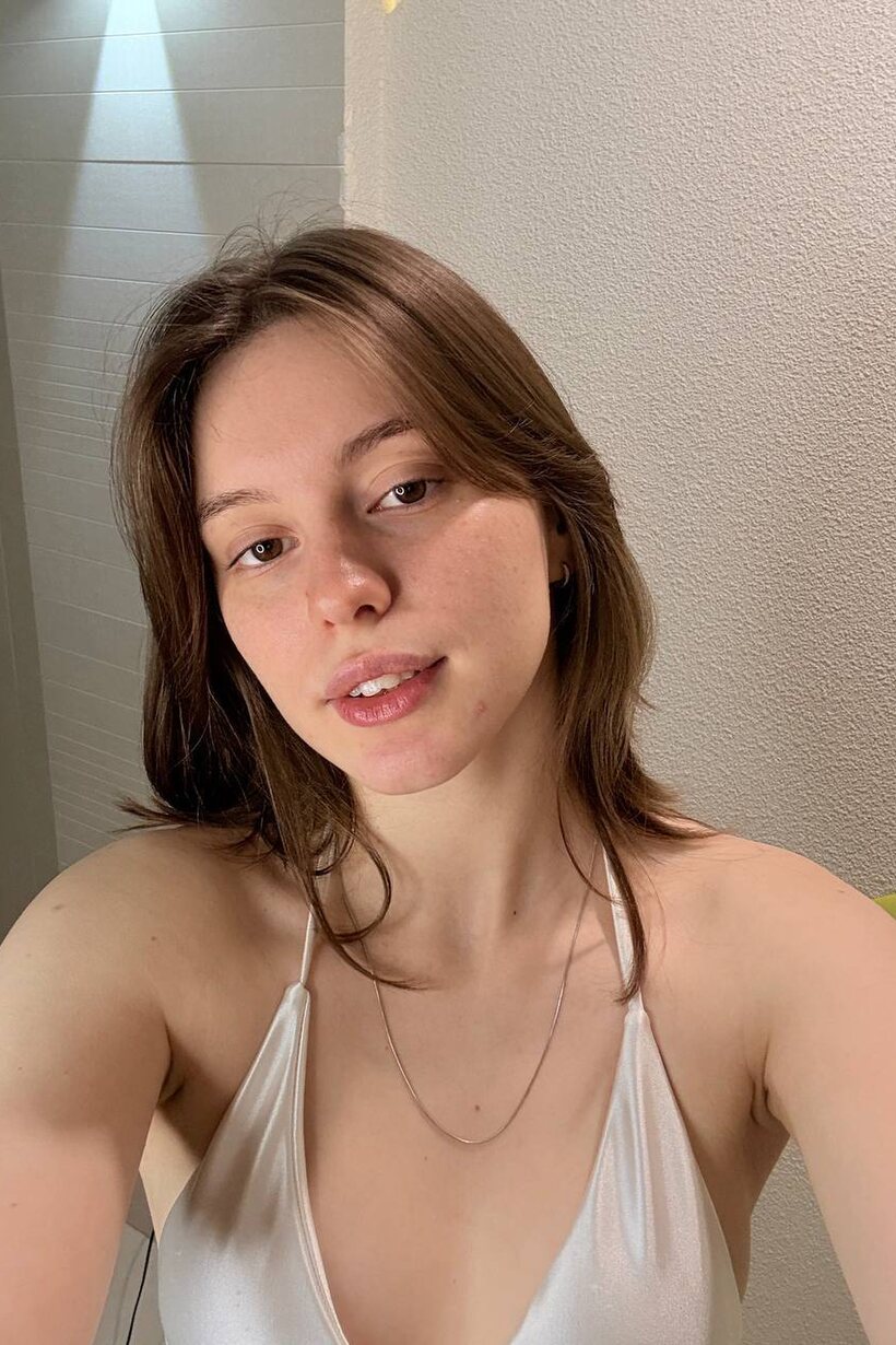 Photo 5 — Taking selfies in a sheer satin bikini, sexy solo girl poses