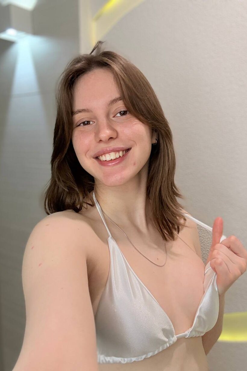 Taking selfies in a sheer satin bikini, sexy solo girl poses (shot 11)