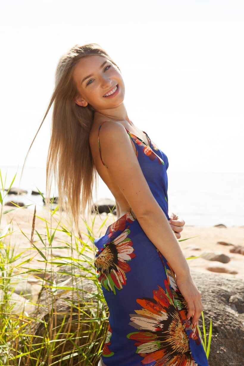 Briana Ilze slips out of her dress for nude beach poses (shot 1)