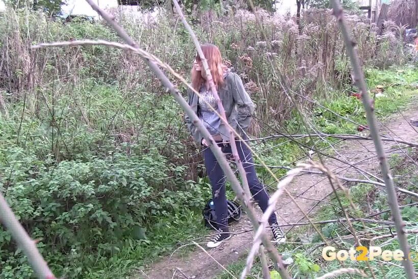 European pic 12 from the set «Denisa spreads her legs and pisses along a dirt path»