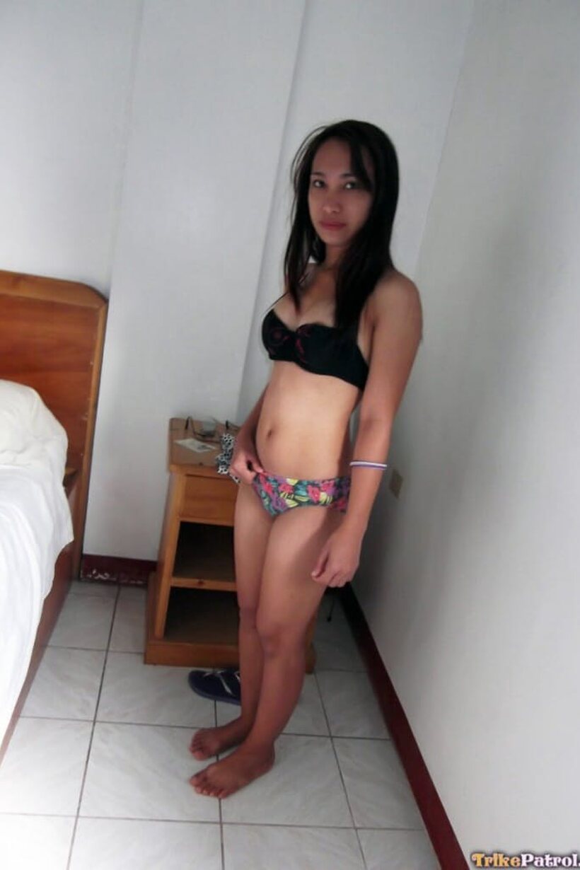 Amateur girl exposes her tiny tits and nipples while undressing (shot 3)