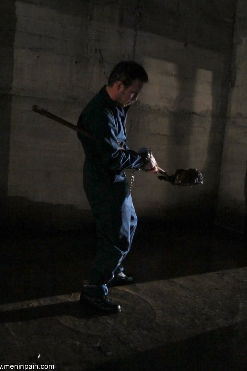 Photo 2 — Isis Love has a male slave obey her inside a dungeon