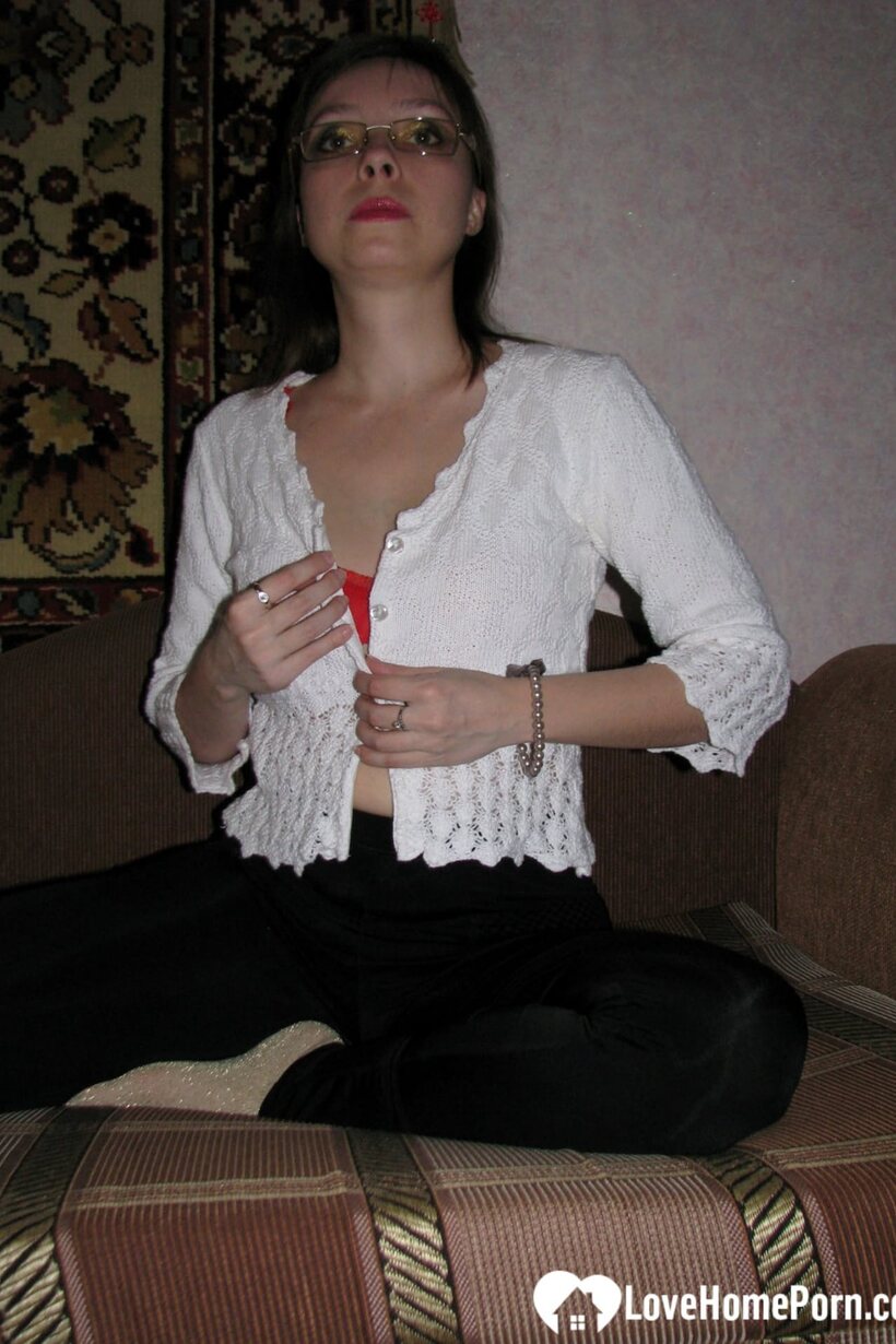 Photo 3 — Stripping to her socks, dark-haired MILF shows off her hairy pussy