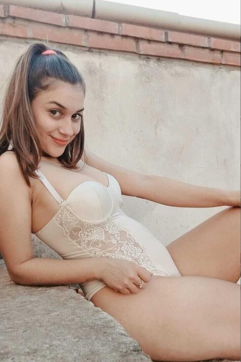 Amateur pic 7 from the set «Latina girl shows her big tits and ass while undressing»