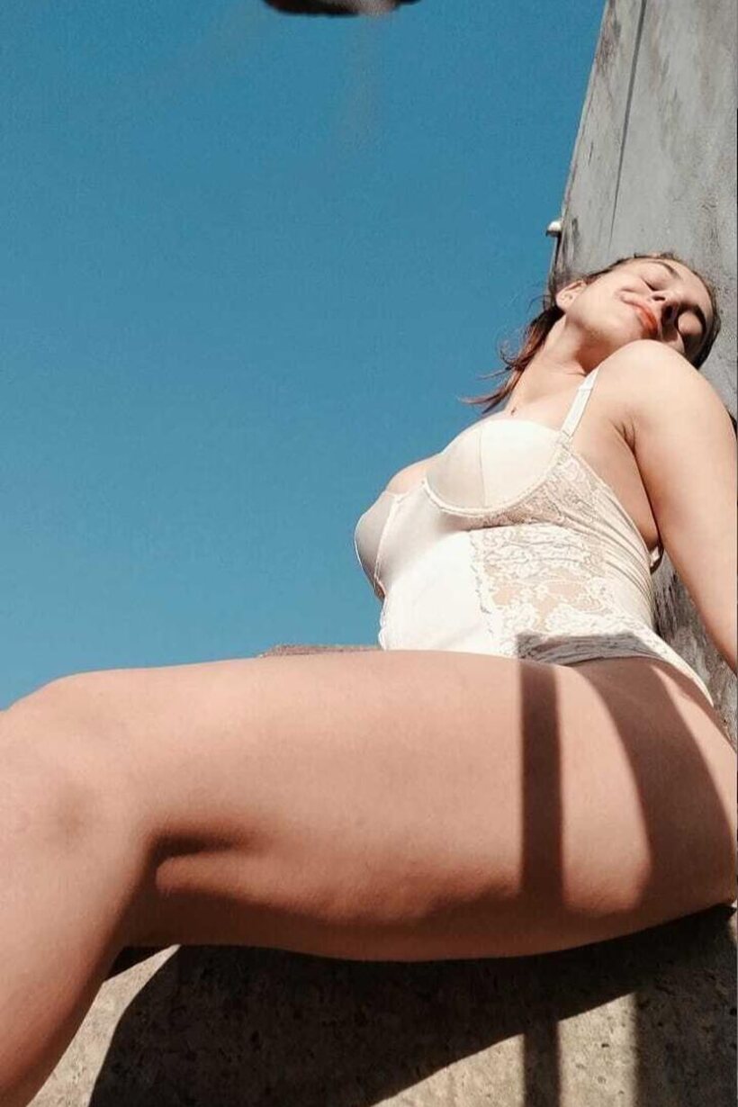 Photo 8 — Latina girl shows her big tits and ass while undressing