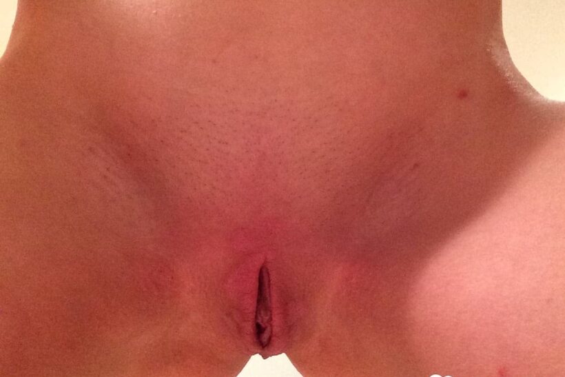 Amateur nude photo 2 — Taking nude selfies, a petite teen flashes tiny tits and shaved pussy