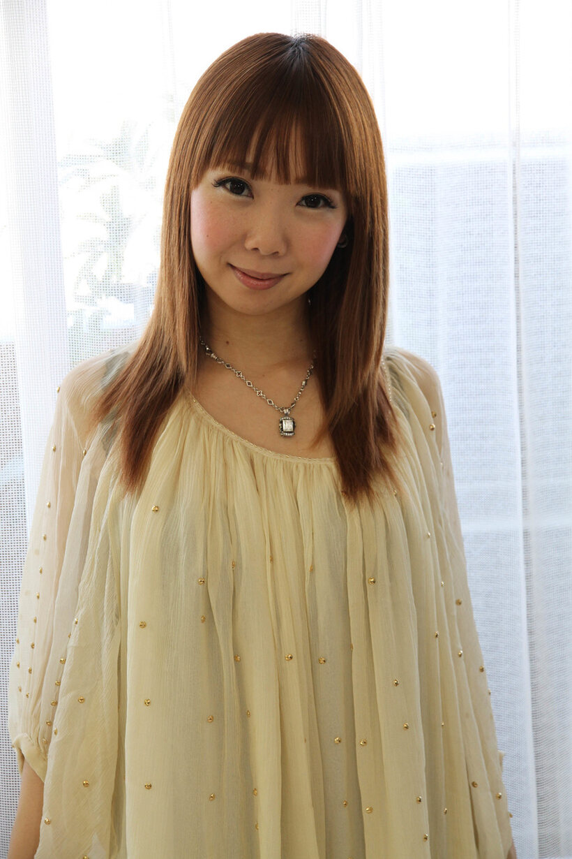 Photo 5 — Japanese babe shows off tiny tits and a hairy pussy