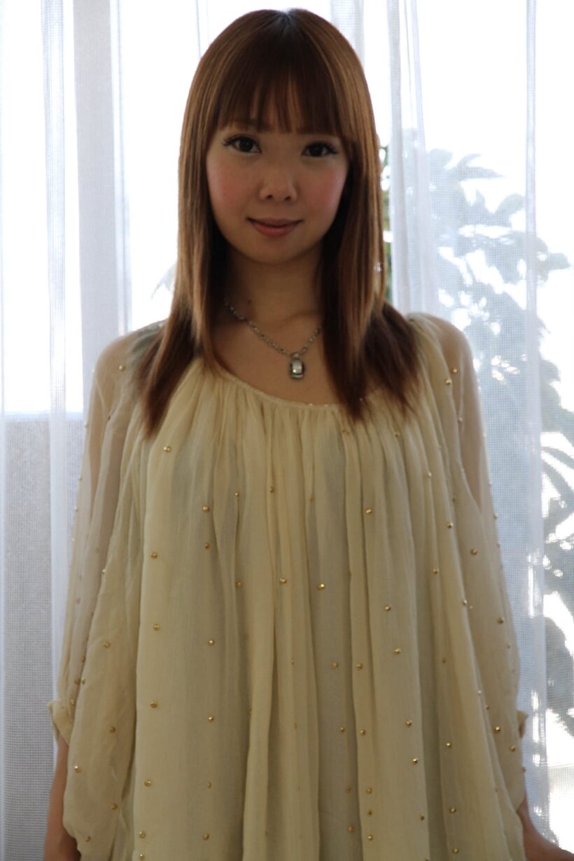 Photo 6 — Japanese babe shows off tiny tits and a hairy pussy
