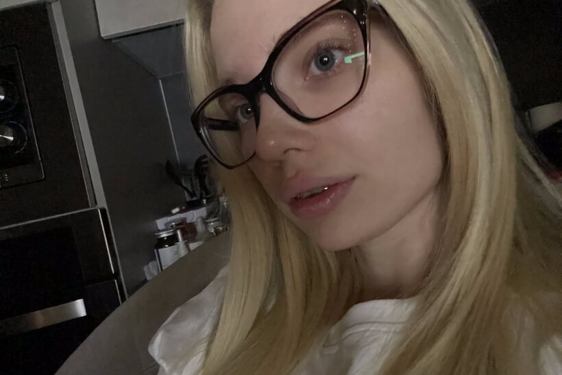 Image 11/20: Blonde girl taking selfies in glasses