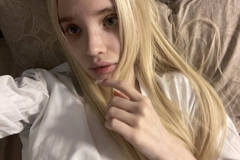 Image 12/20: Blonde girl taking selfies in glasses