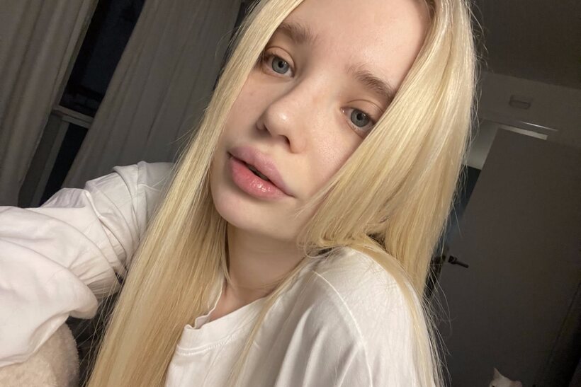 Photo 16 — Blonde girl taking selfies in glasses