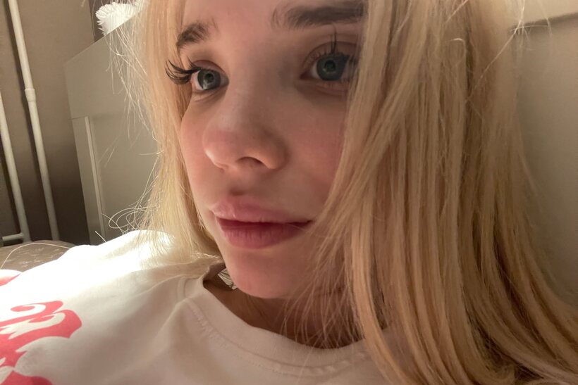 Image 18/20: Blonde girl taking selfies in glasses