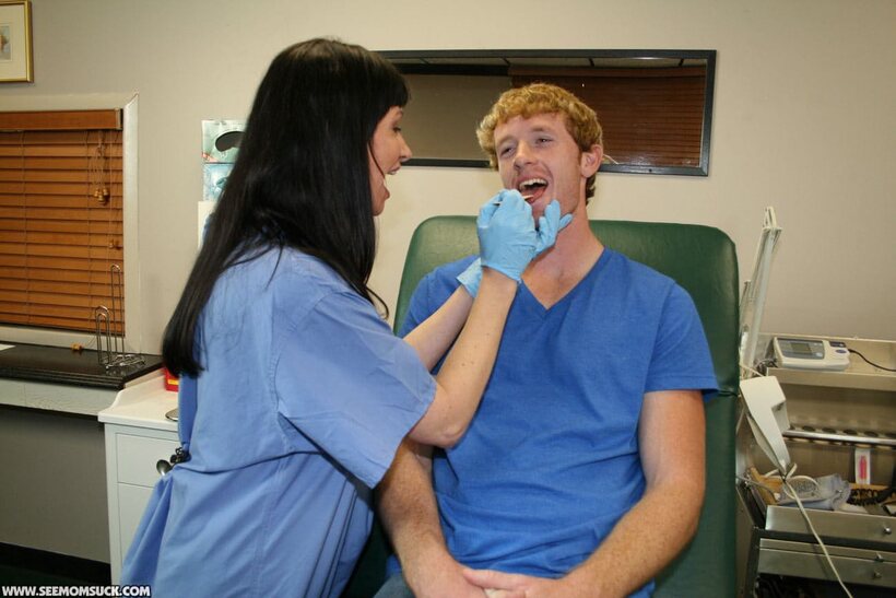 Photo 5 — Angie Noir gives her horny patient a sweet blowjob as nurse