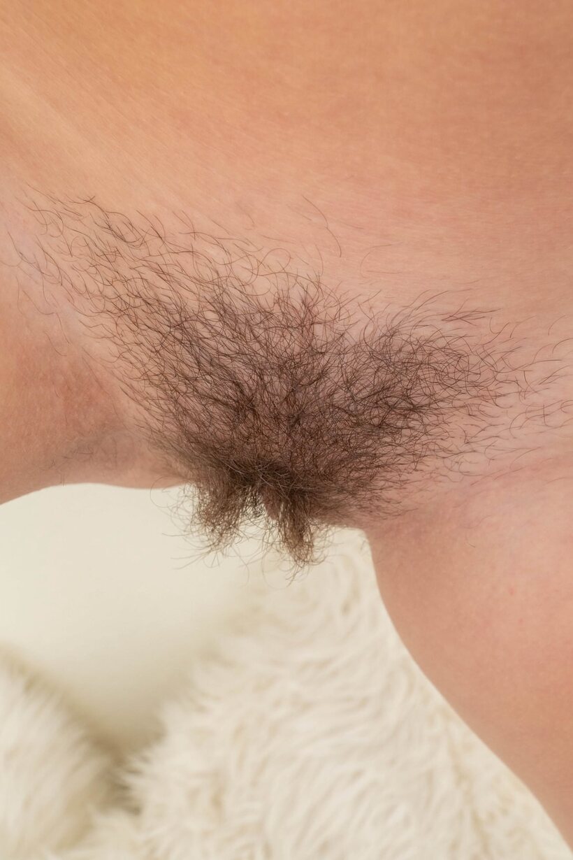 Amateur pic 18 from the set «Teagan strips down and fingers her hairy pussy lips, glasses on»
