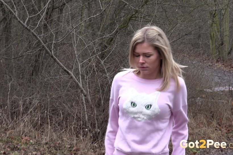 Beautiful Claudia Macc exposes her pussy while pissing (shot 1)