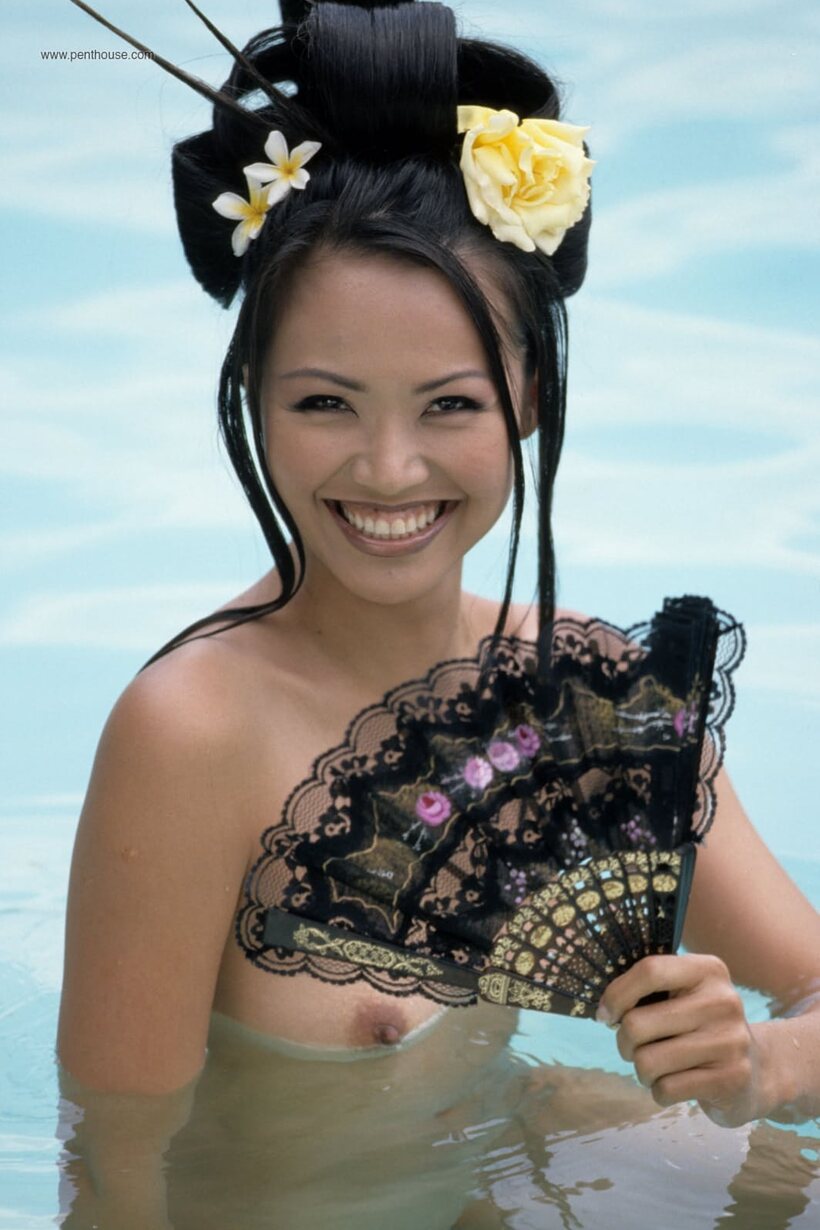 Image 18/20: Caroline Koh shows off her slim body while posing in the pool