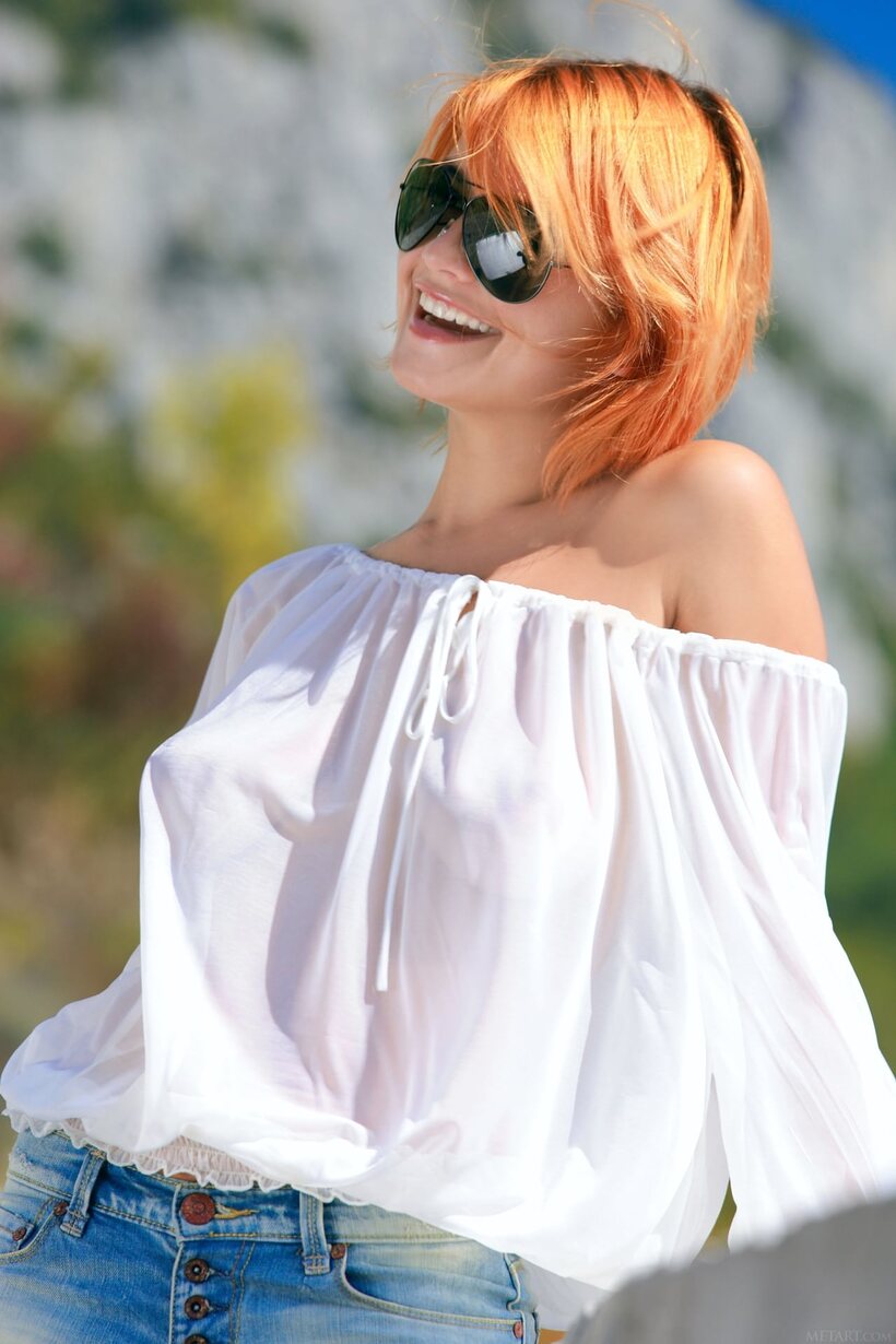 Redhead Violla A shows off her open legs and feet outdoors, photo 2 of 20
