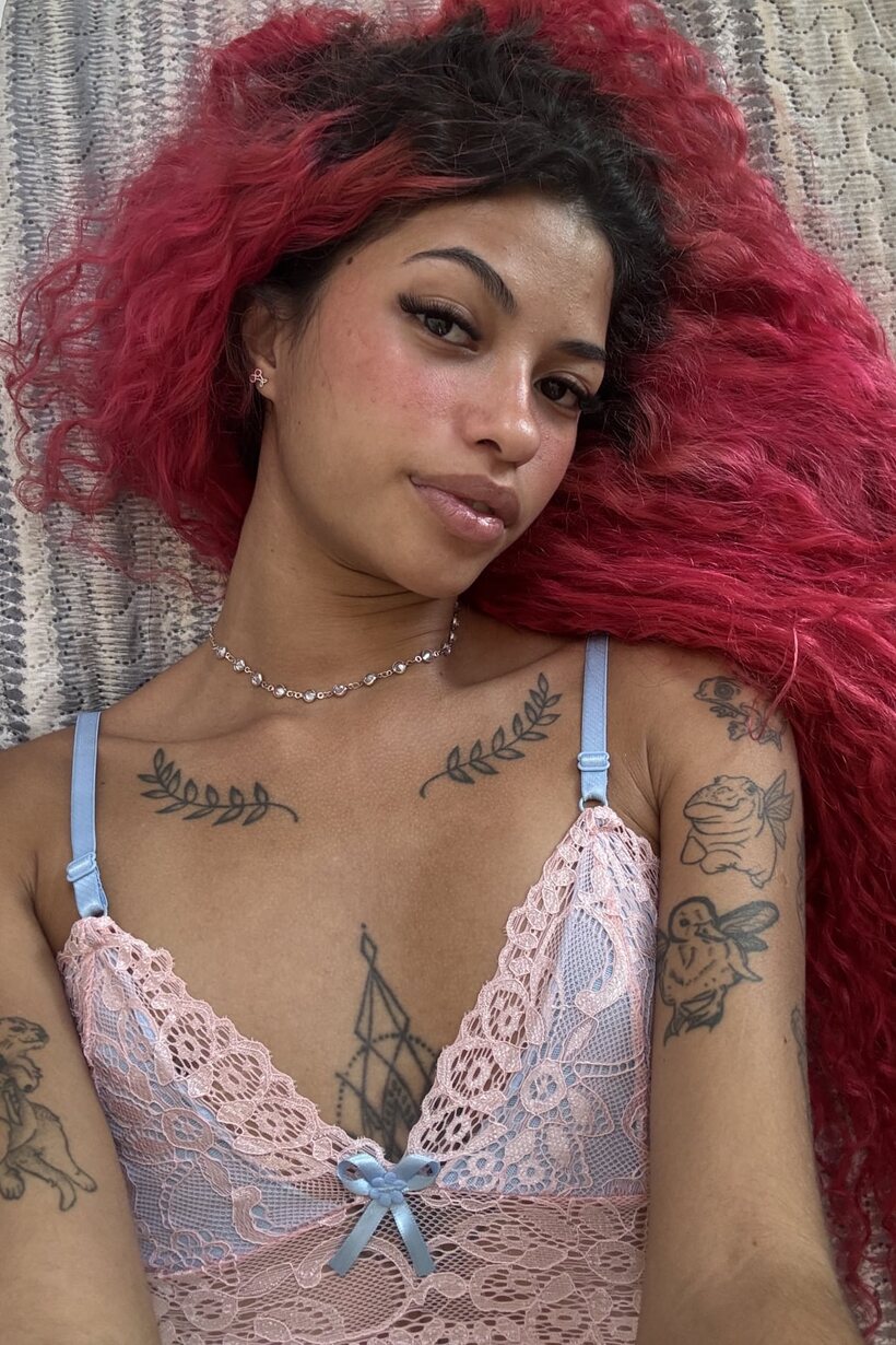 Cute girl exposes her natural tits (shot 8)