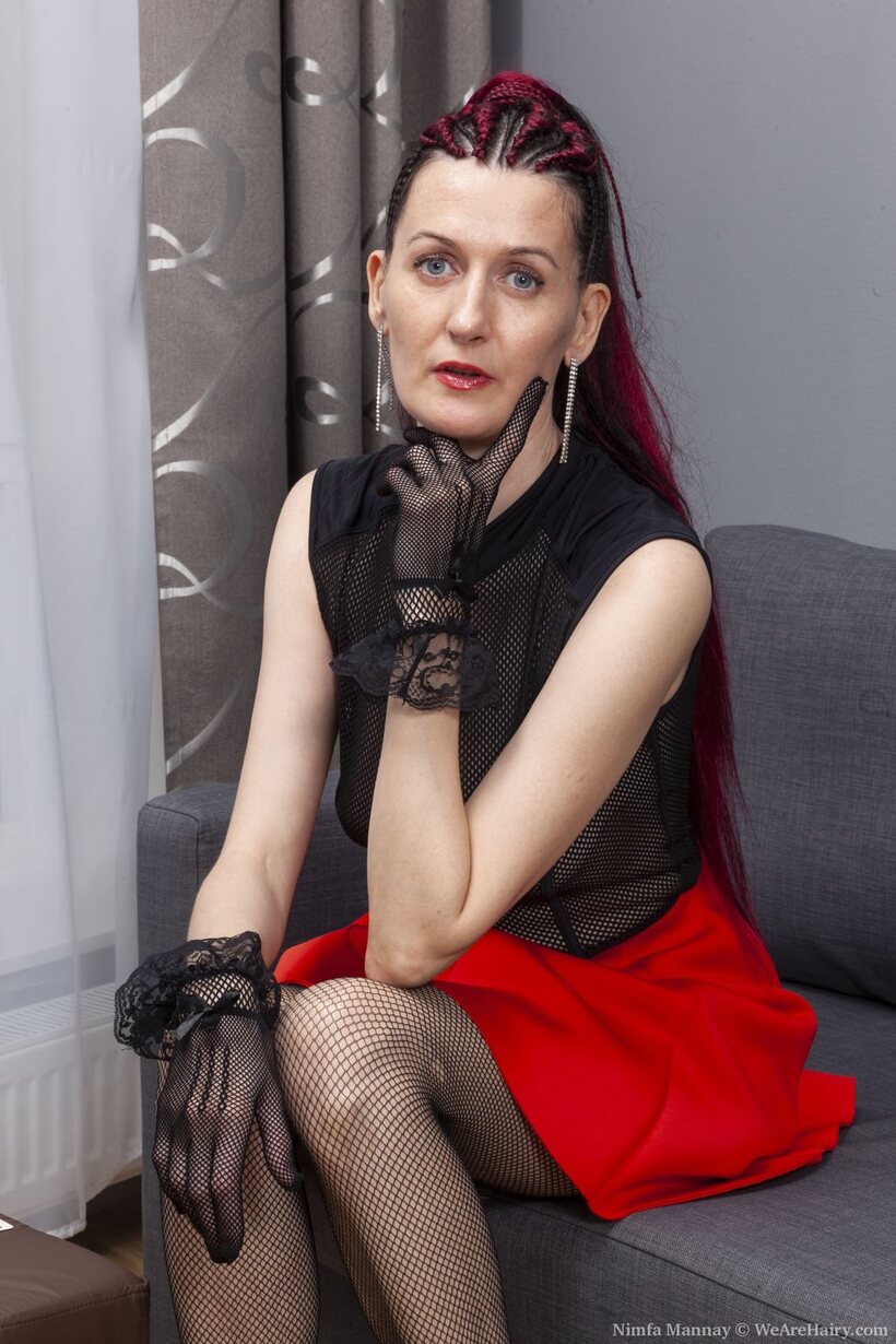 Skinny Nimfa Mannay flaunts her saggy tits and hairy armpits while undressing (shot 1)