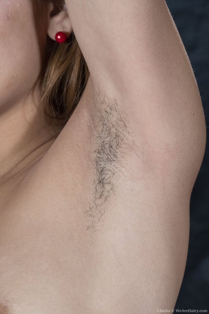 Amateur nude photo 8 — Clarita flashes a close-up view of her hairy pussy and armpit