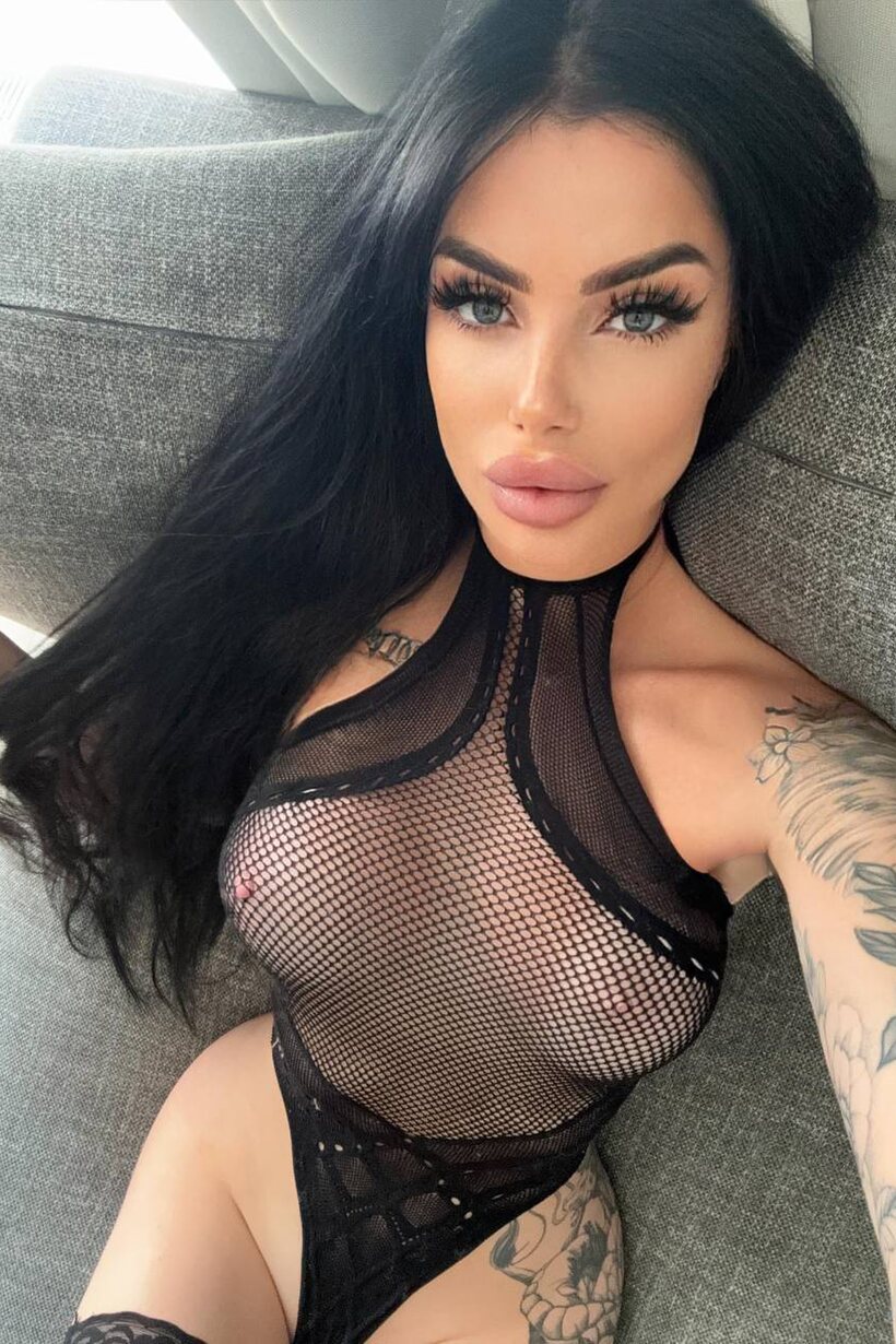 Image 1/10: Crotchless bodystocking leaves this gorgeous brunette’s phat ass exposed