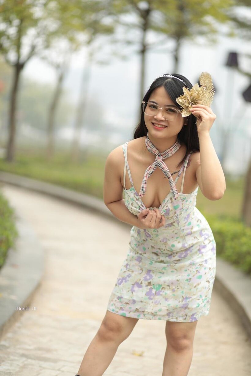 Photo 15 — Asian girl gets naked outdoors