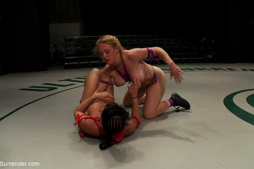 Photo 19 — Mahina Zaltana and Dee Williams pose sexily before the wrestling match