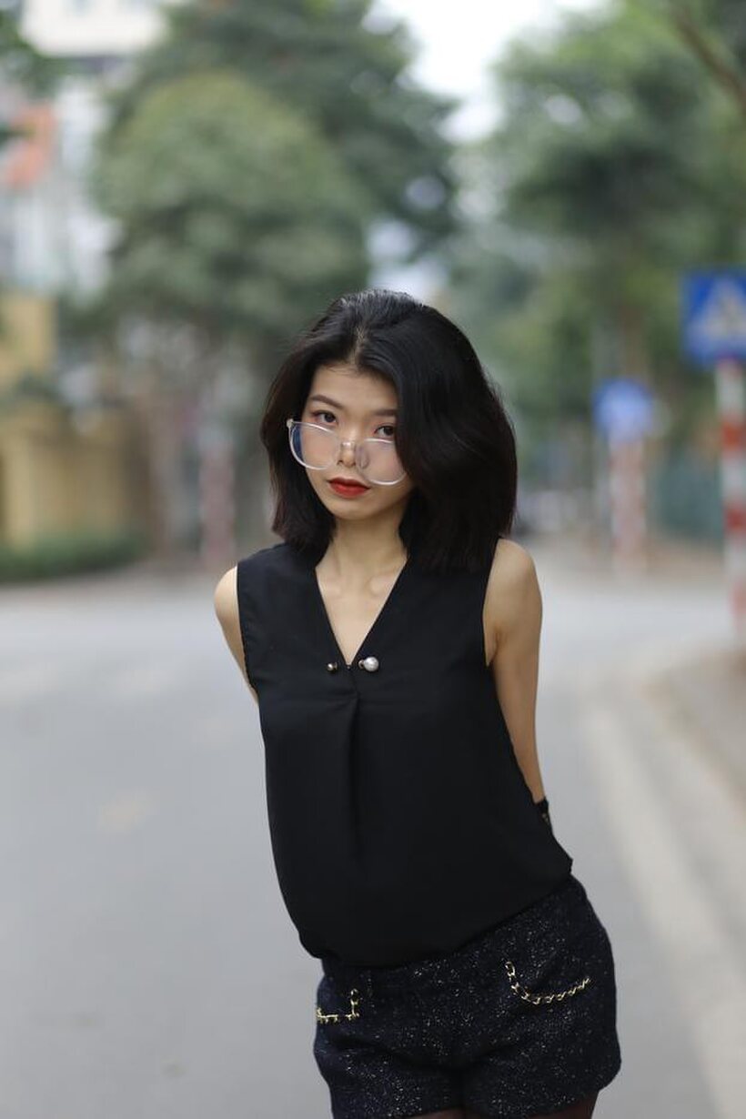 Image 17/21: Asian girl exposes her body outdoors
